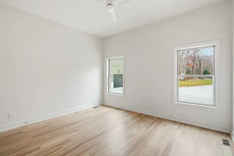 a view of an empty walk in closet