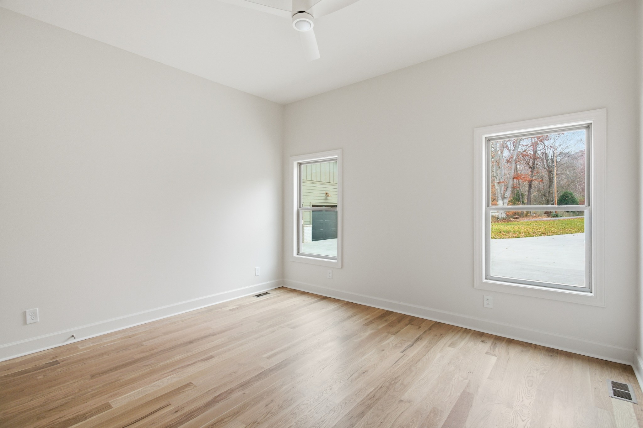 2957 Pace Road Clarksville, TN 37043 - Photo 31 of 67 a view of an empty room with wooden floor and a window