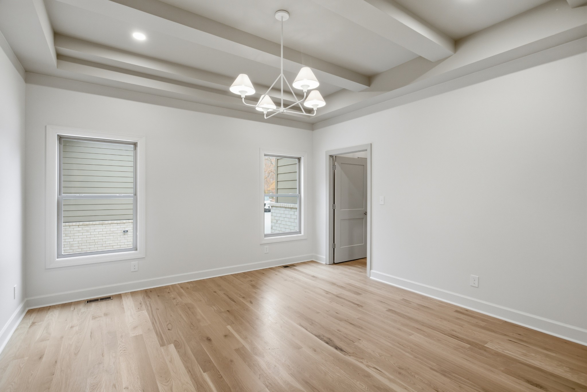 2957 Pace Road Clarksville, TN 37043 - Photo 35 of 82 a view of an empty room with a window and wooden floor