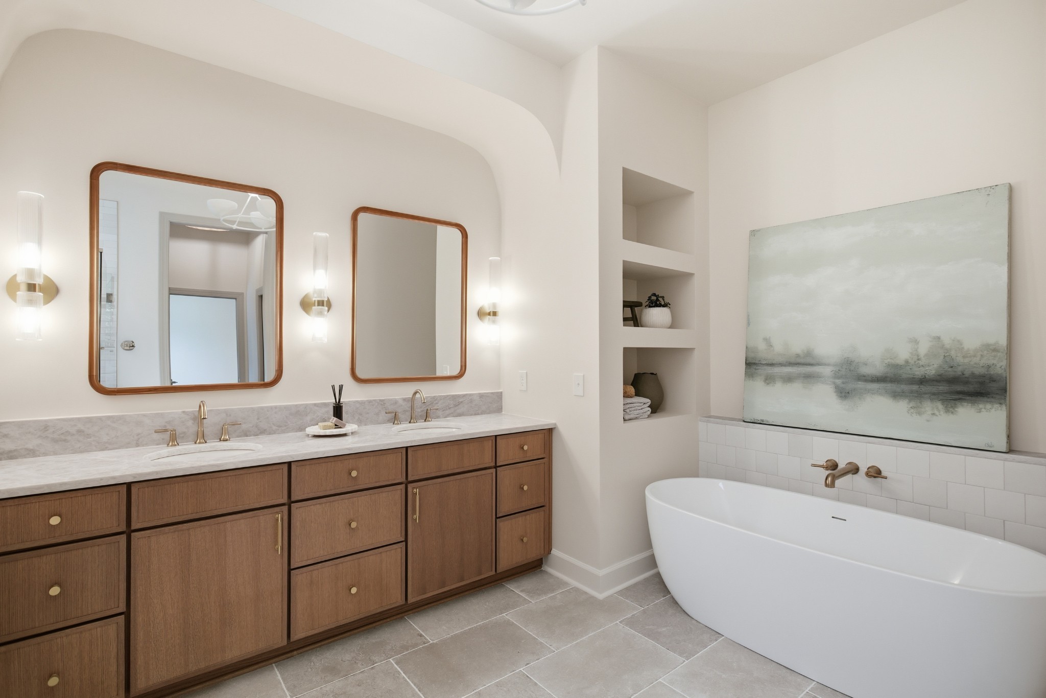 2957 Pace Road Clarksville, TN 37043 - Photo 36 of 67 a bathroom with a tub a double vanity sink and mirror