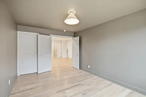 a bathroom with a bathtub shower sink vanity and toilet