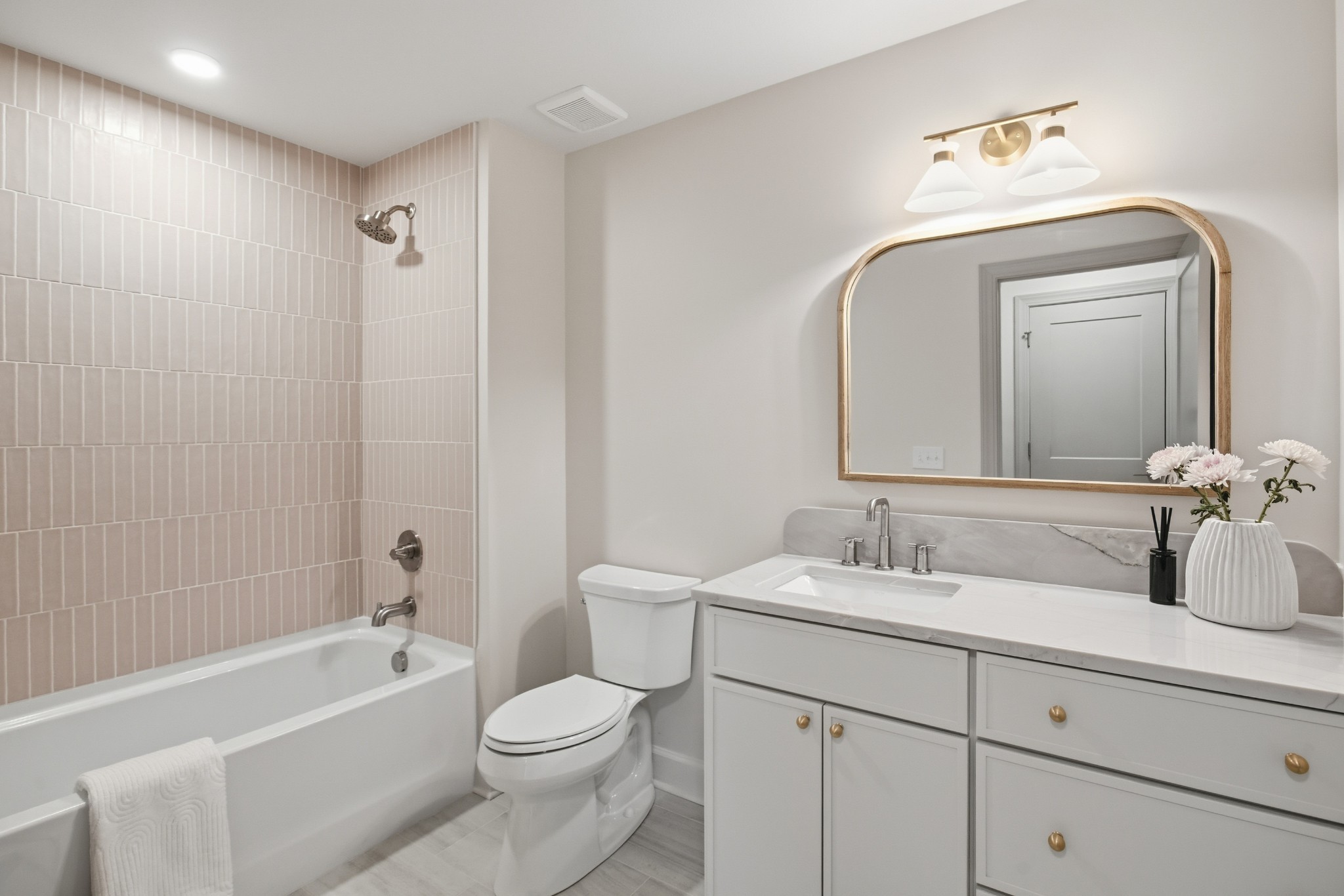 2957 Pace Road Clarksville, TN 37043 - Photo 55 of 67 a bathroom with a toilet a sink a mirror a bathtub and vanity