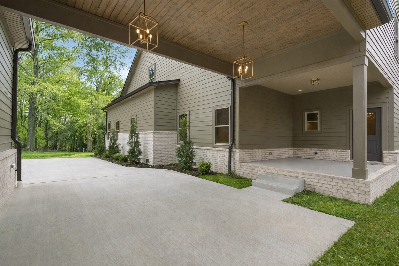 2957 Pace Road Clarksville, TN 37043 - Photo 57 of 67 a front view of a house with a yard and garage