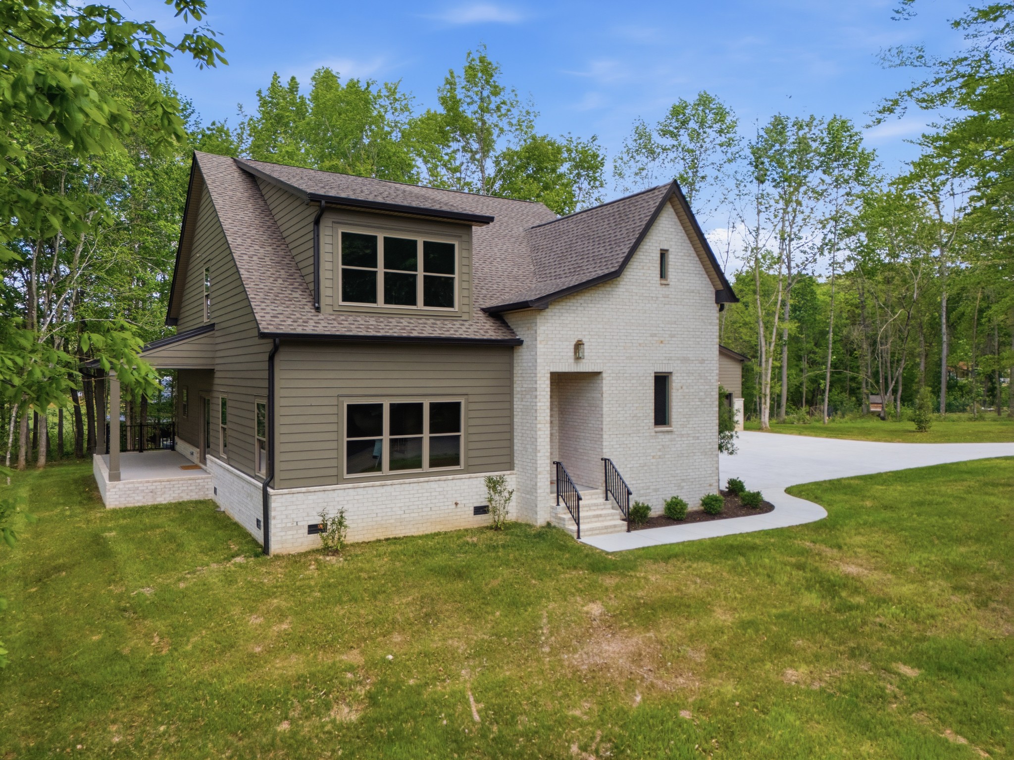 2957 Pace Road Clarksville, TN 37043 - Photo 62 of 82 a front view of house with yard and trees in the background