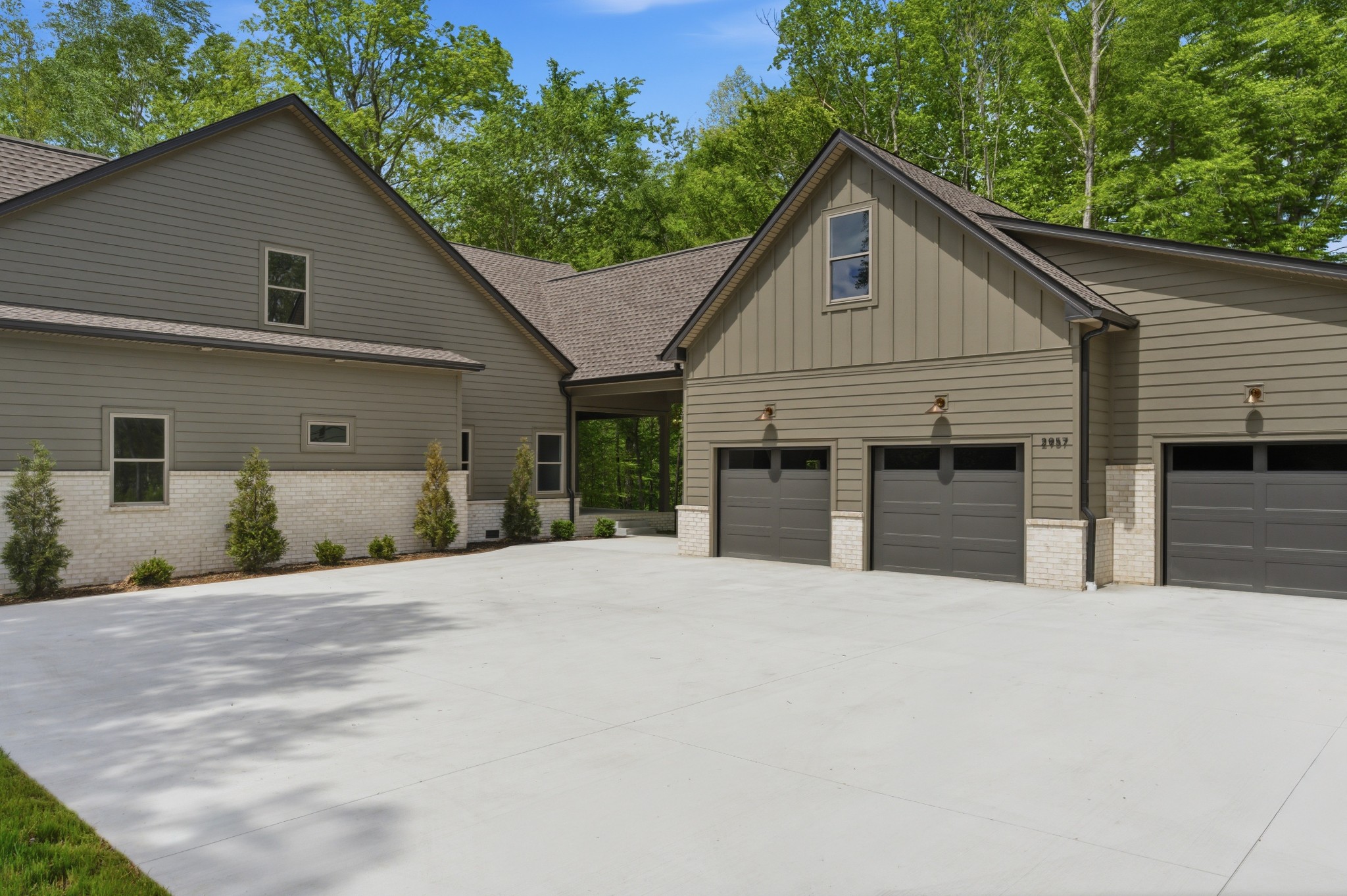 2957 Pace Road Clarksville, TN 37043 - Photo 67 of 82 a front view of a house with yard and trees in the background