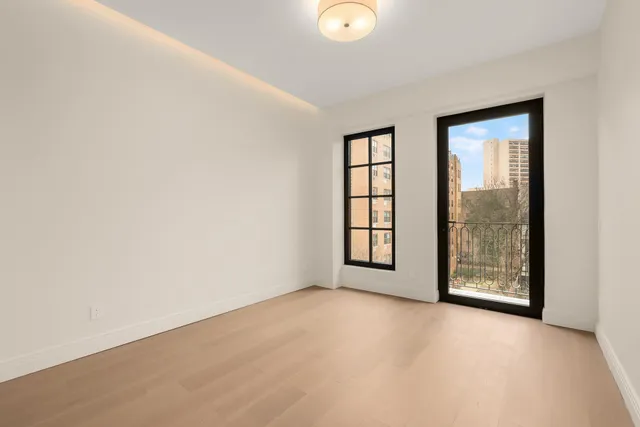 an empty room with windows