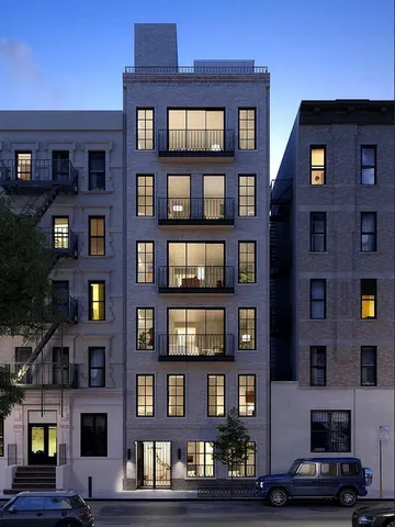 a front view of multi story residential apartment building