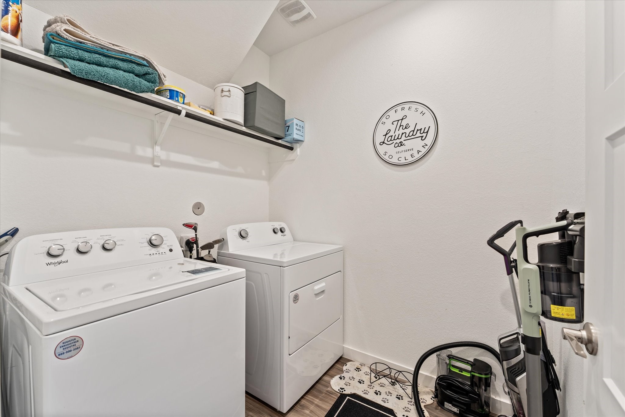 10212 Prairie Creek Lane Conroe, TX 77384 - Photo 19 of 41 a view of storage and utility room with a washer and dryer