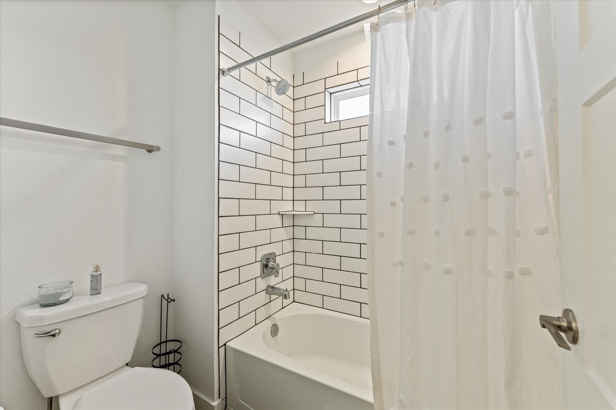 10212 Prairie Creek Lane Conroe, TX 77384 - Photo 31 of 41 a bathroom with a toilet and shower