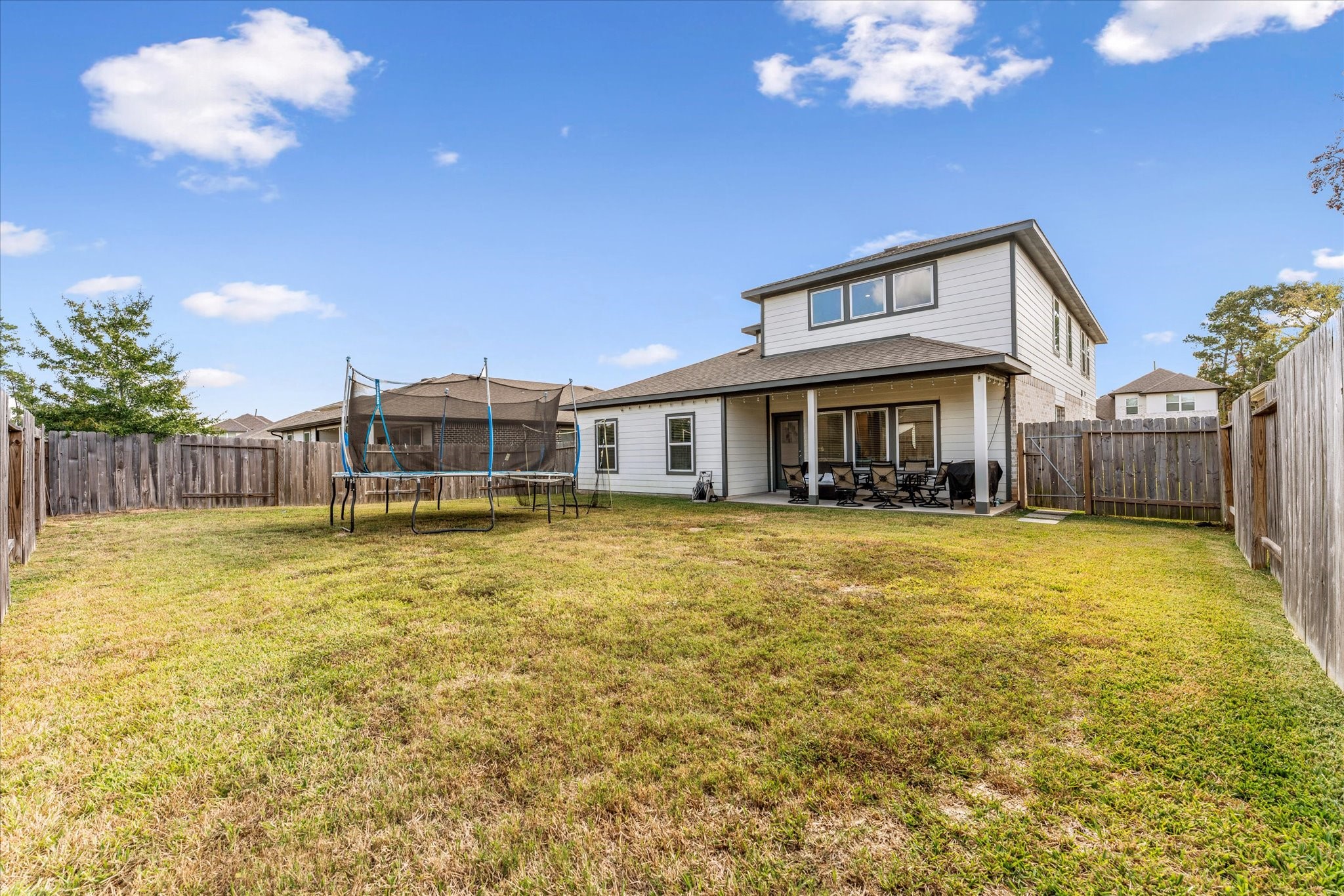 10212 Prairie Creek Lane Conroe, TX 77384 - Photo 39 of 41 a front view of a house with swimming pool