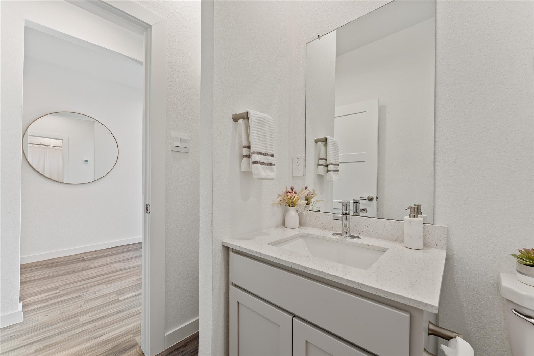 10212 Prairie Creek Lane Conroe, TX 77384 - Photo 7 of 41 a bathroom with a sink and a mirror