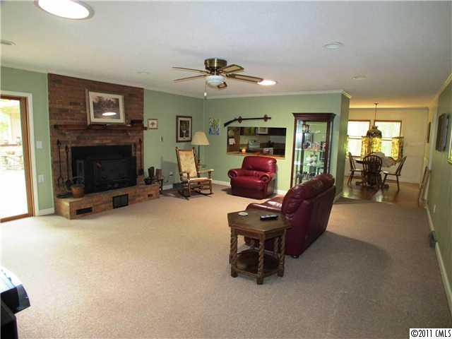 9601 Belt Road Midland, NC 28107 - Photo 11 of 16 a living room with furniture and a fireplace