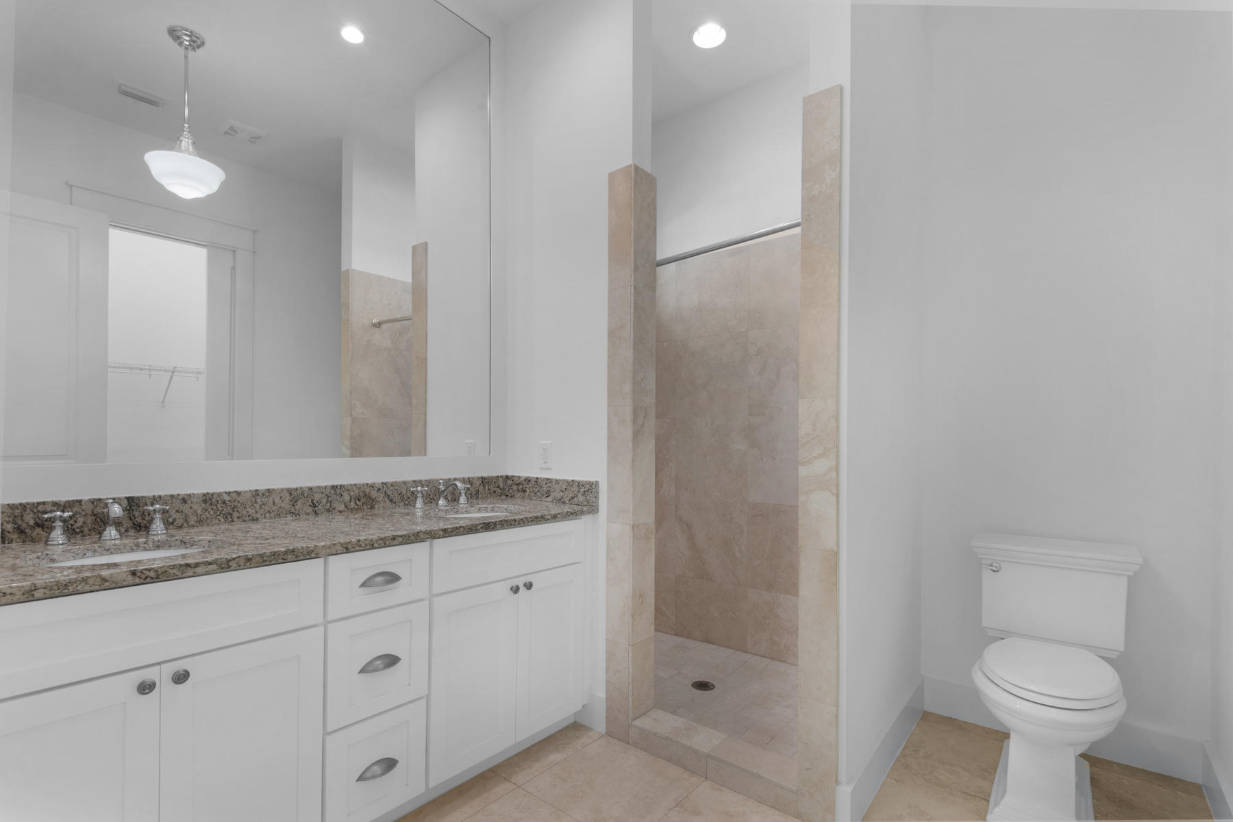 10 Gulfview Way Santa Rosa Beach, FL 32459 - Photo 11 of 30 a bathroom with a granite countertop sink a toilet and a mirror