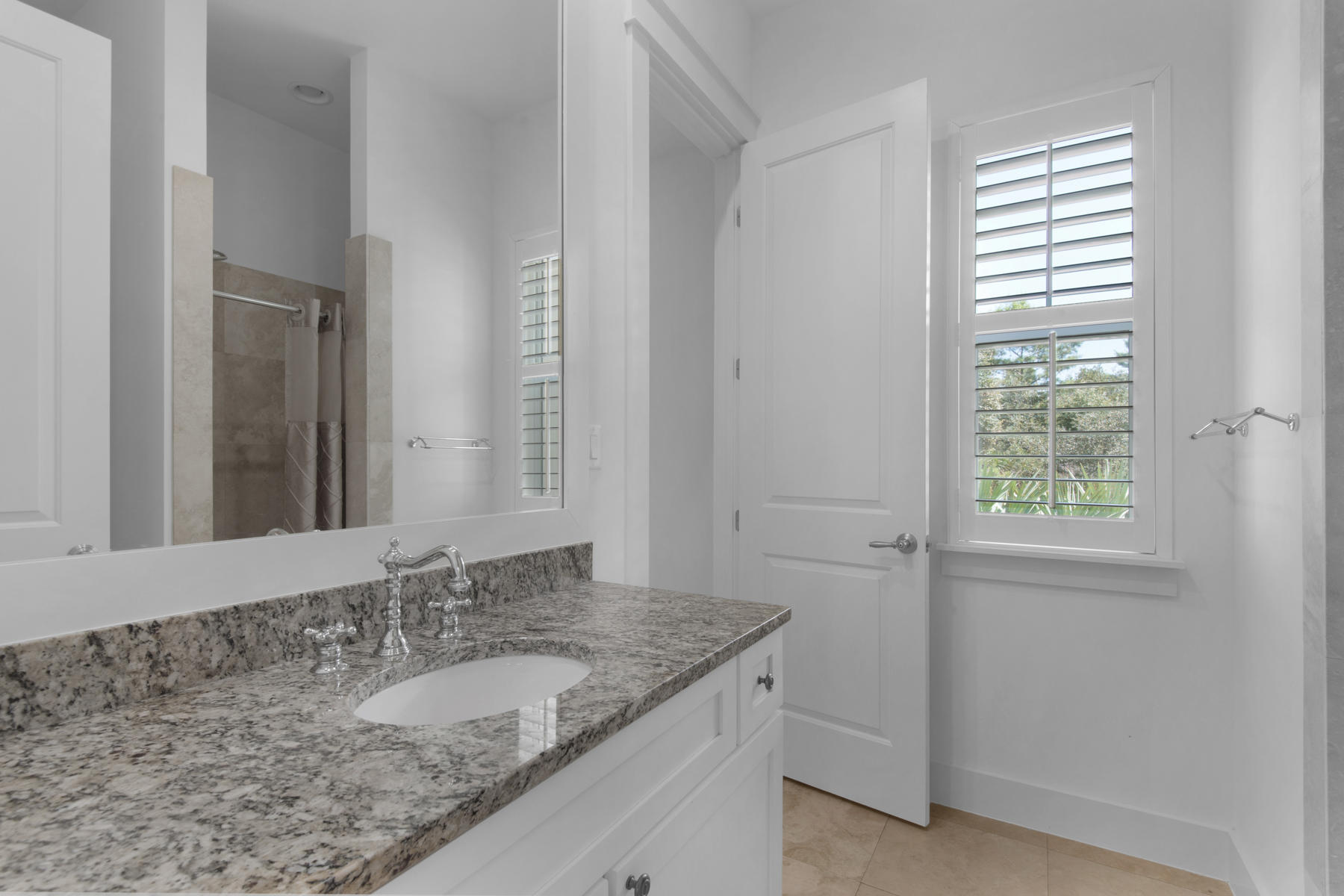 10 Gulfview Way Santa Rosa Beach, FL 32459 - Photo 14 of 30 a bathroom with a granite countertop sink and a mirror
