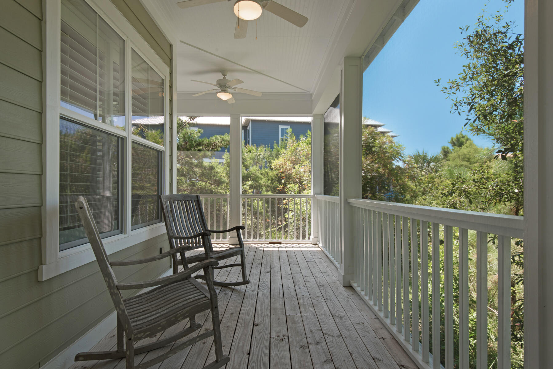 10 Gulfview Way Santa Rosa Beach, FL 32459 - Photo 18 of 30 a view of a balcony with chair and wooden floor