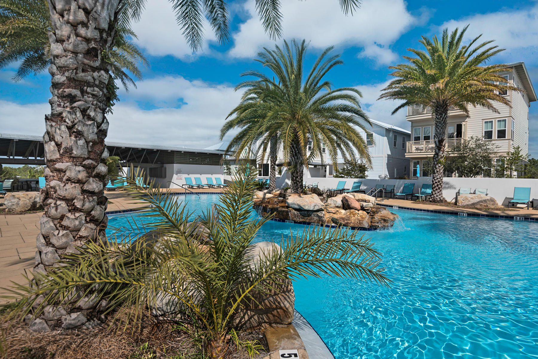 10 Gulfview Way Santa Rosa Beach, FL 32459 - Photo 26 of 30 a row of palm trees and a yard with swimming pool