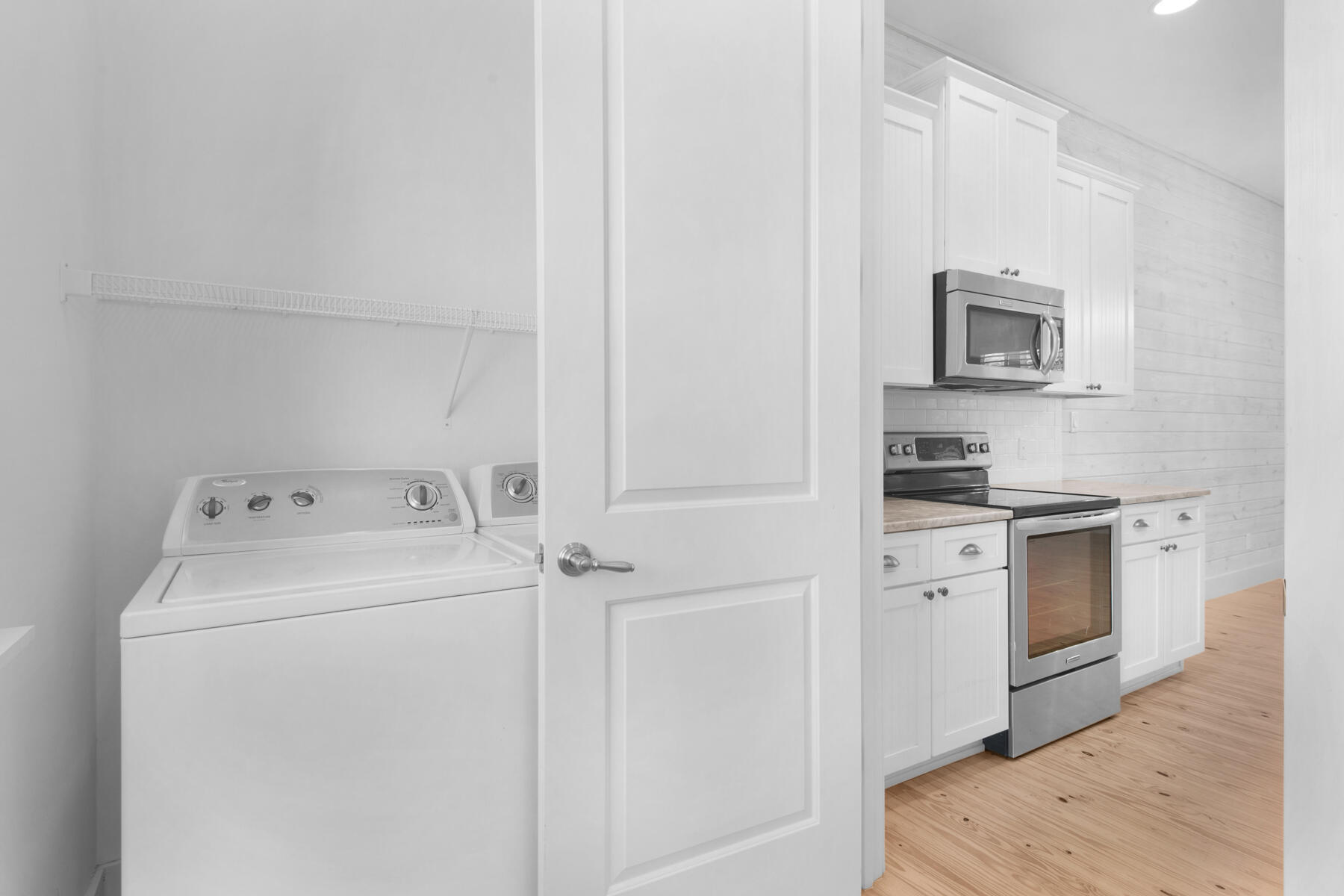 10 Gulfview Way Santa Rosa Beach, FL 32459 - Photo 10 of 30 a view of washer and dryer with bathroom in the background