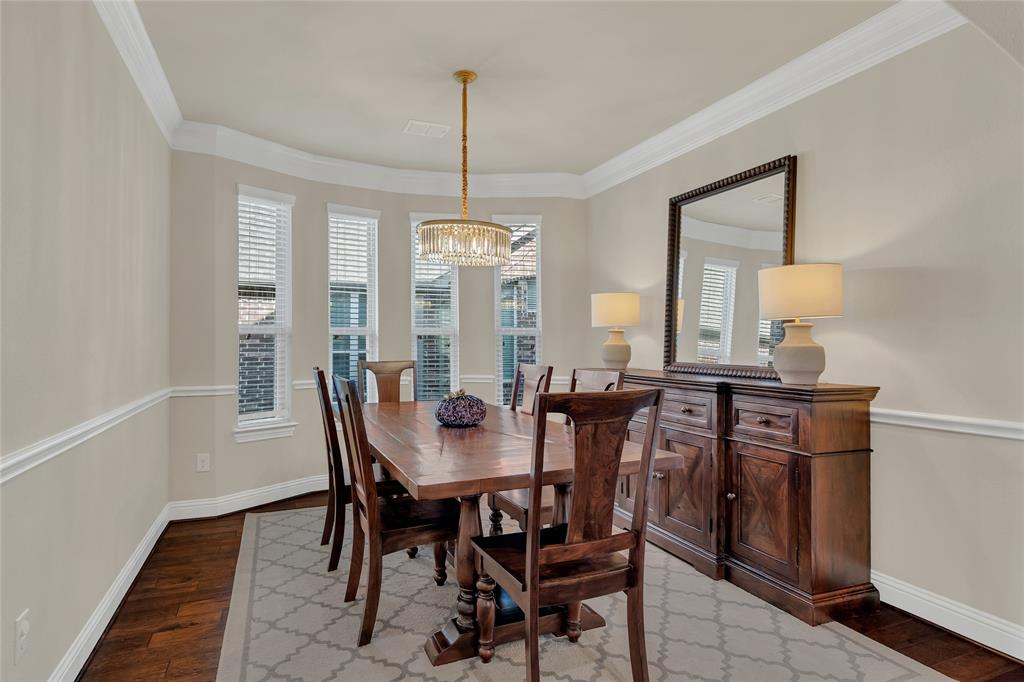 2852 Exeter Drive Trophy Club, TX 76262 - Photo 11 of 40 a view of a dining room with furniture window and wooden floor