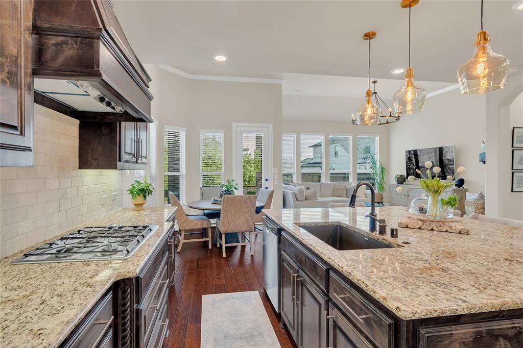 2852 Exeter Drive Trophy Club, TX 76262 - Photo 40 of 40 a kitchen with sink stove and cabinets
