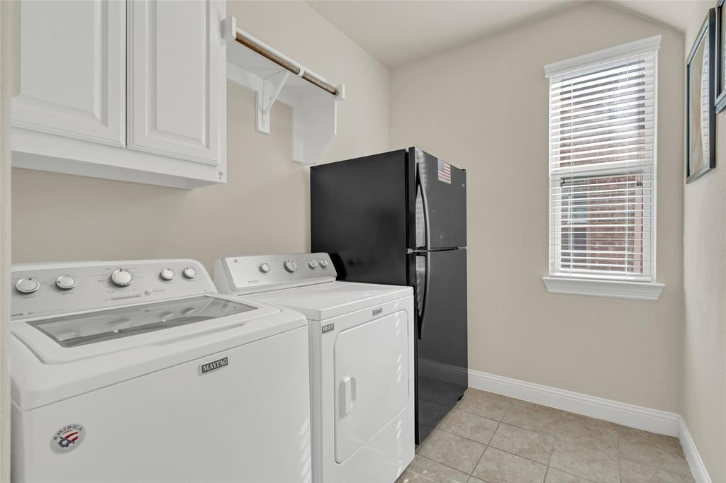 2852 Exeter Drive Trophy Club, TX 76262 - Photo 29 of 40 a utility room with dryer and washer