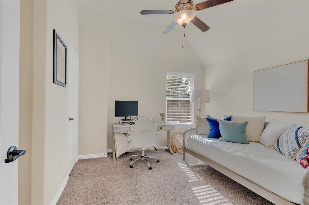 2852 Exeter Drive Trophy Club, TX 76262 - Photo 30 of 40 a living room with furniture and a flat screen tv