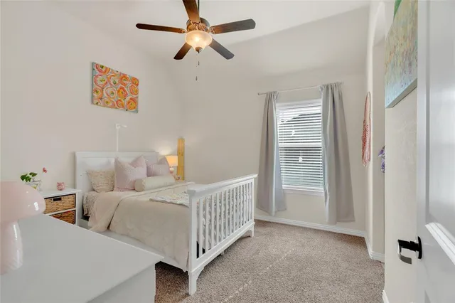 a bathroom with a bathtub and a toilet