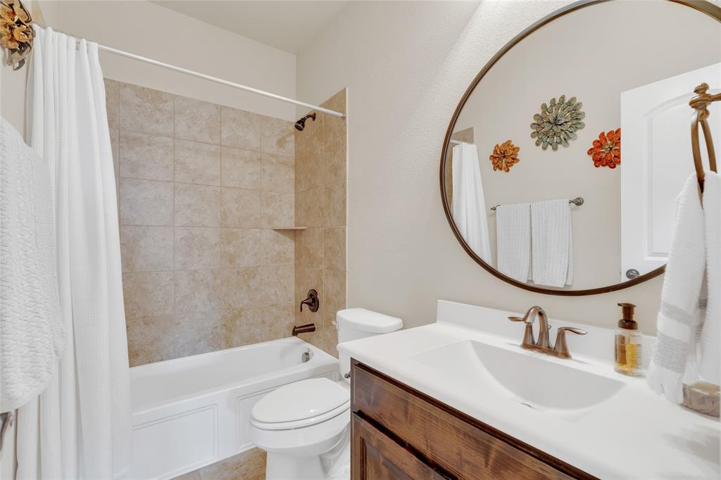 2852 Exeter Drive Trophy Club, TX 76262 - Photo 37 of 40 a bathroom with a sink toilet and a mirror