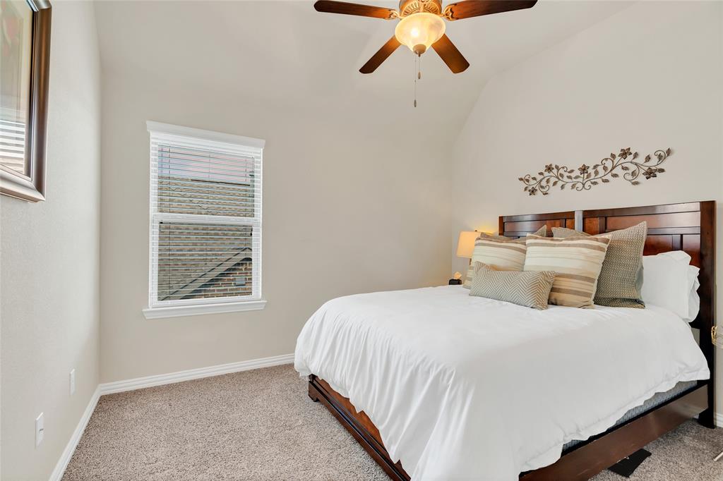 2852 Exeter Drive Trophy Club, TX 76262 - Photo 38 of 40 a bedroom with a bed and a window
