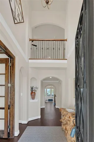 a view of a livingroom with furniture and front door