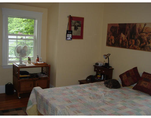 35 Aberdeen Road Arlington, MA 02476 - Photo 12 of 14 a bedroom with a bed and wooden floor