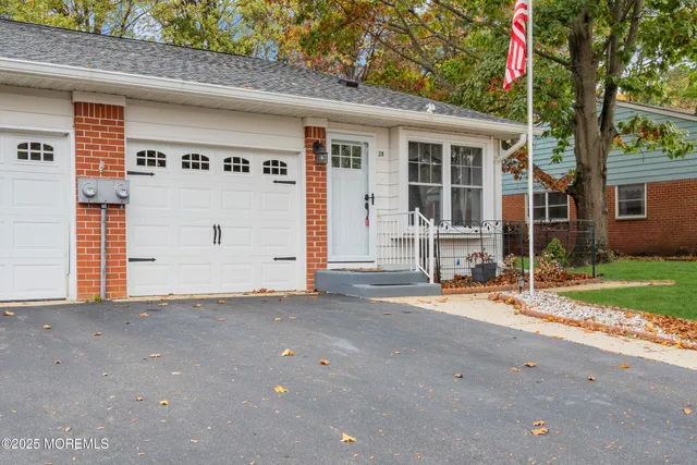 front view of a house with a street