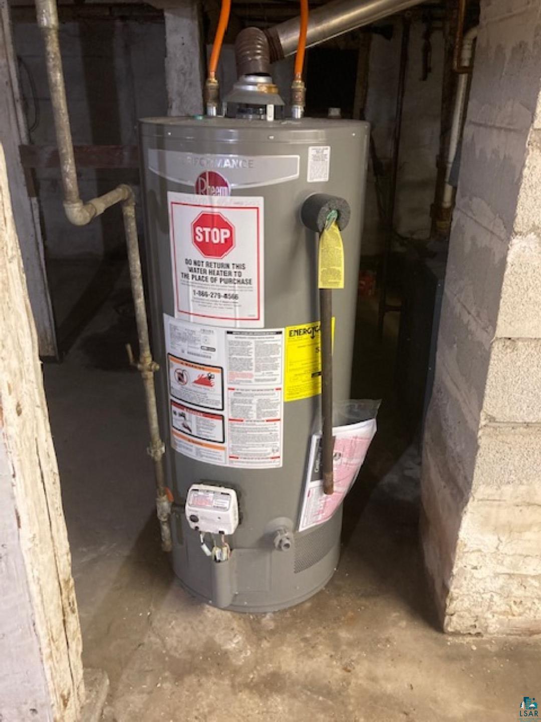 3729 West 2nd Street Duluth, MN 55807 - Photo 22 of 29 Utility room featuring water heater