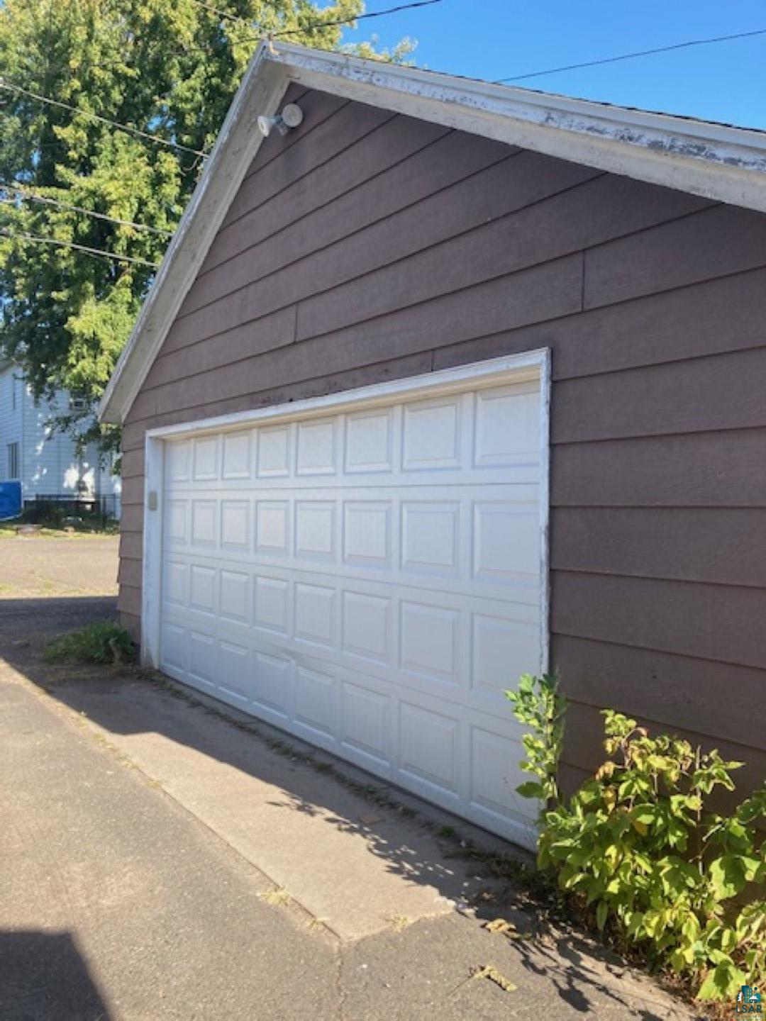3729 West 2nd Street Duluth, MN 55807 - Photo 25 of 29 Garage with wooden walls