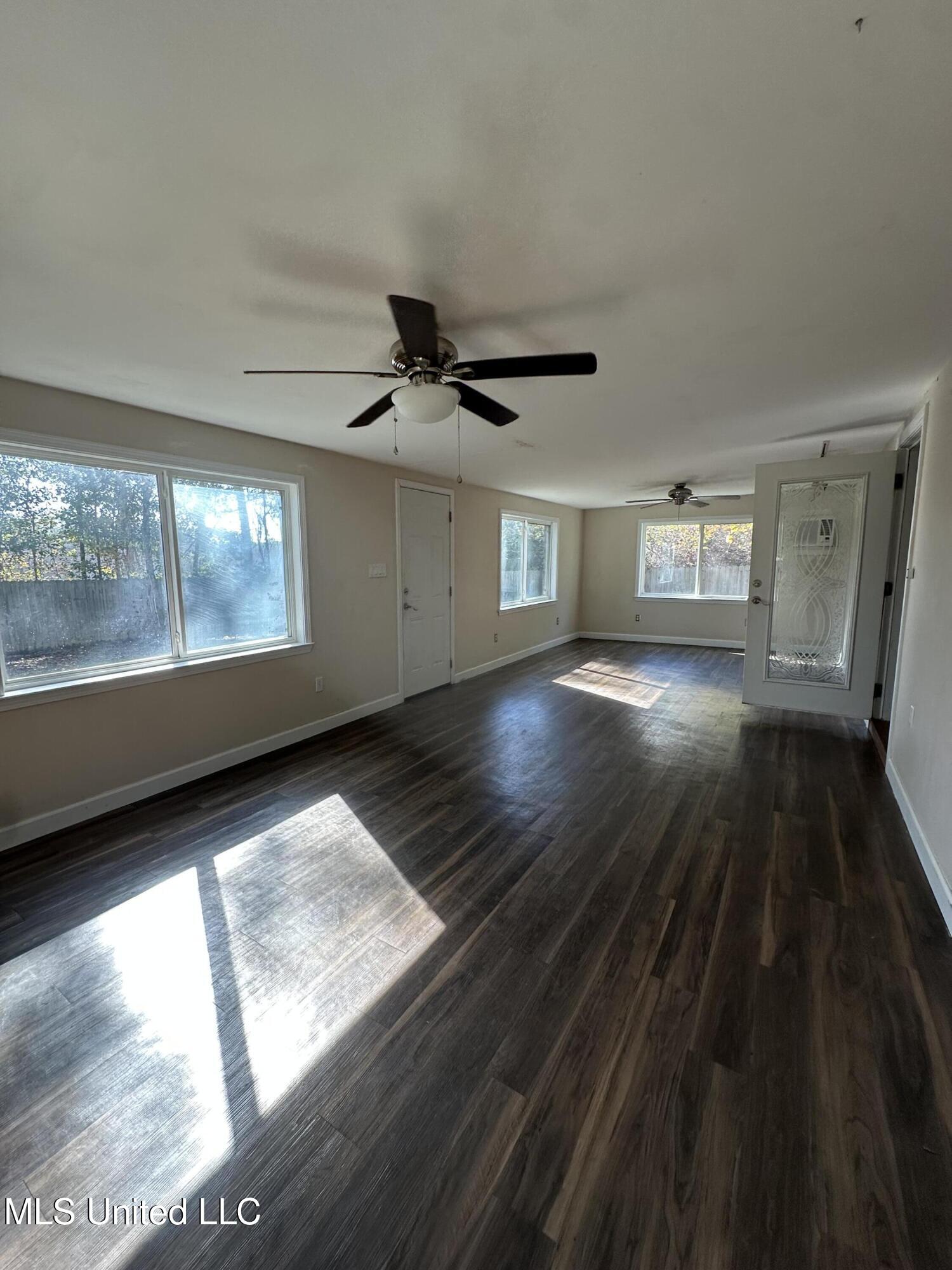 6838 Apona Street Diamondhead, MS 39525 - Photo 16 of 18 Sunroom