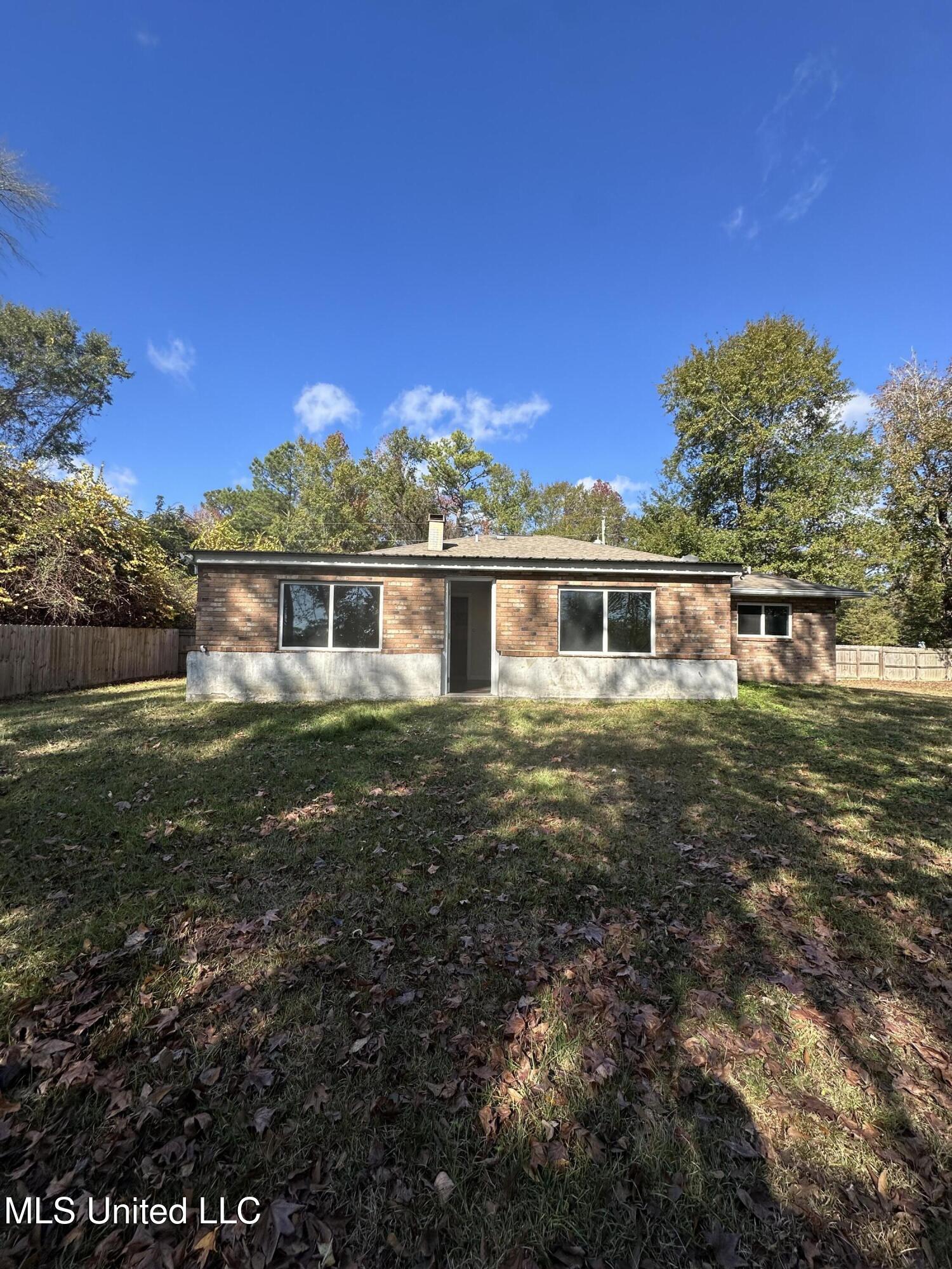 6838 Apona Street Diamondhead, MS 39525 - Photo 17 of 18 Rear Exterior