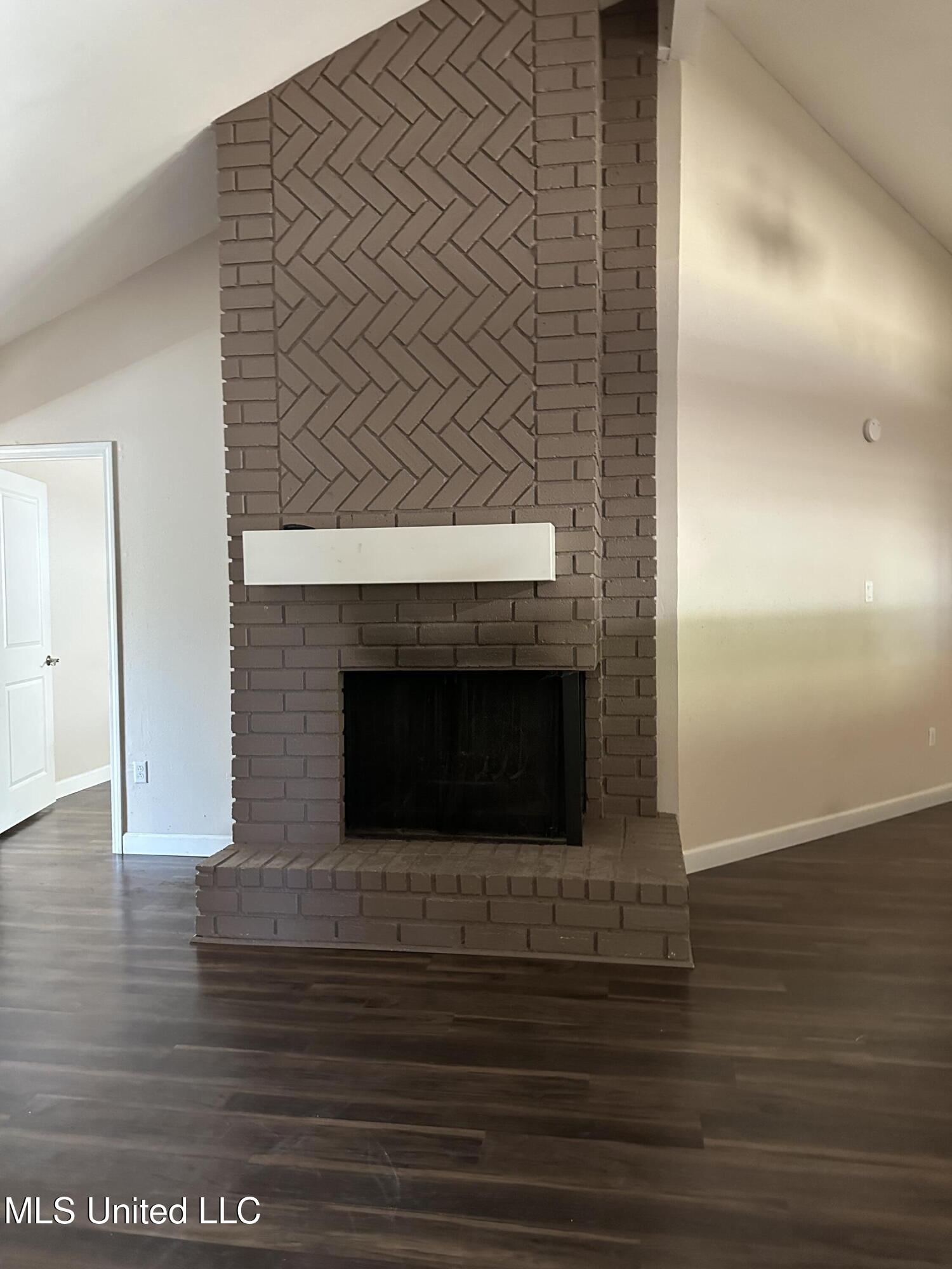 6838 Apona Street Diamondhead, MS 39525 - Photo 2 of 18 Living Room FIreplace