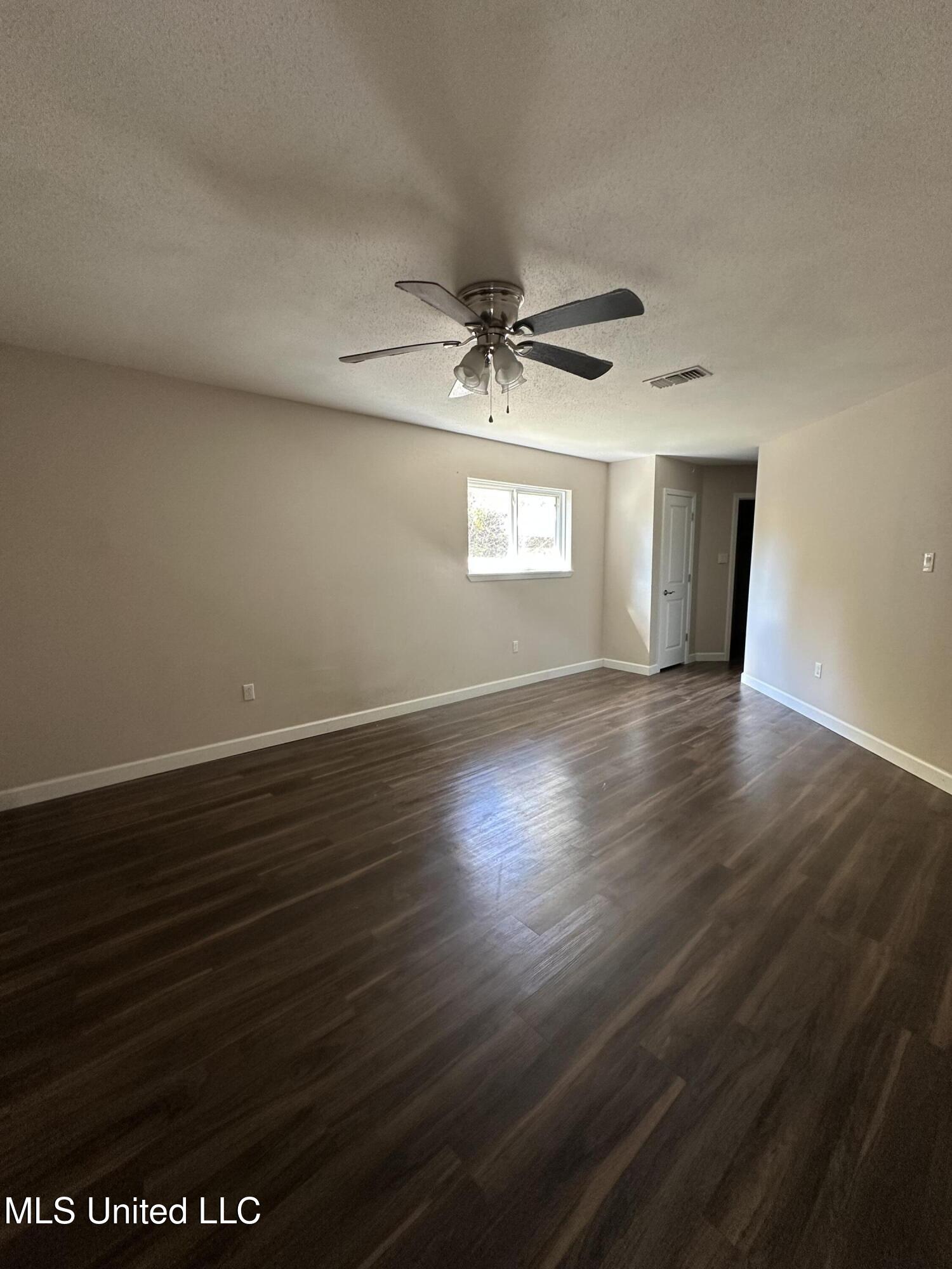 6838 Apona Street Diamondhead, MS 39525 - Photo 7 of 18 Primary Bedroom