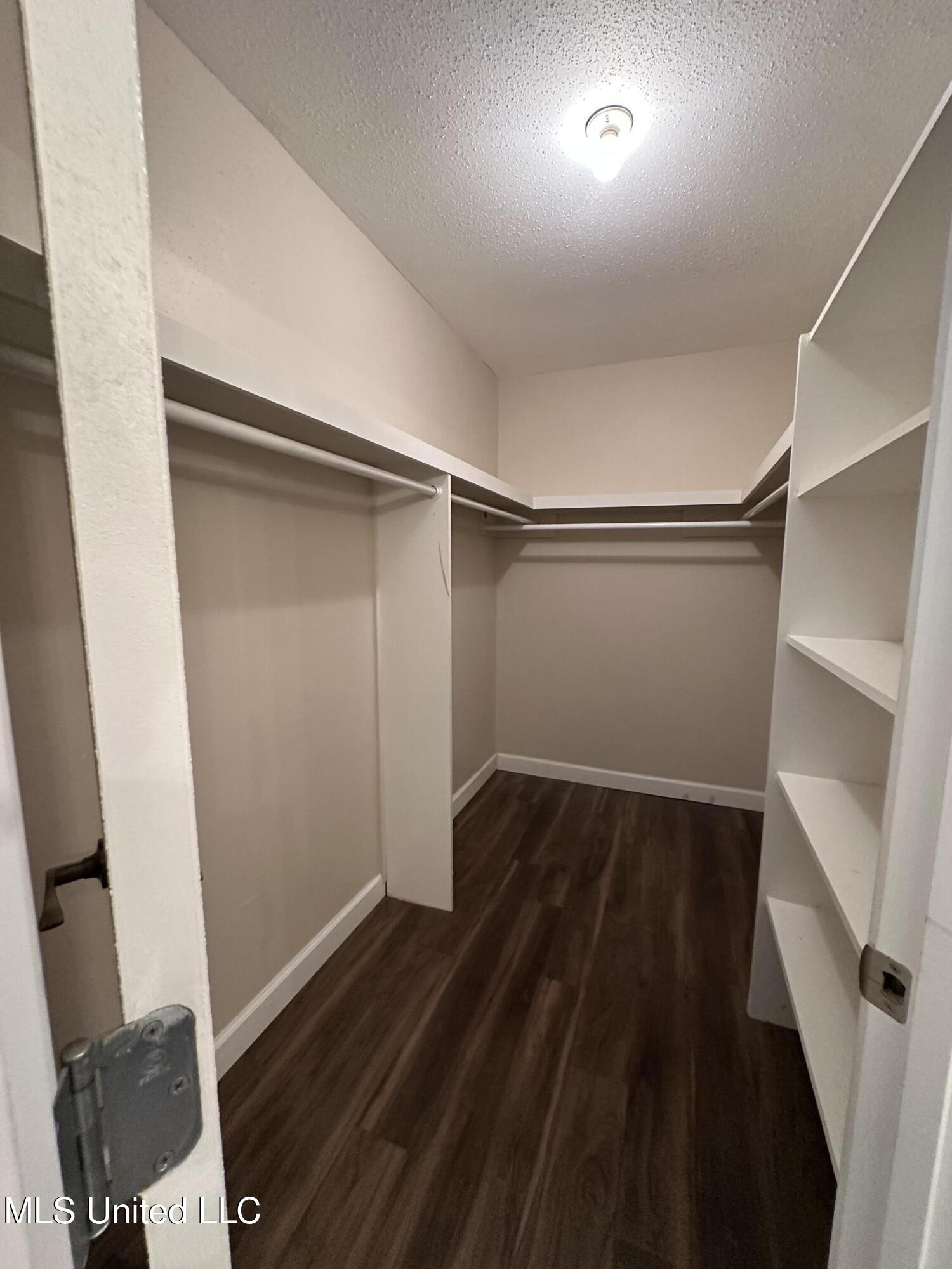 6838 Apona Street Diamondhead, MS 39525 - Photo 8 of 18 Primary Bedroom Closet