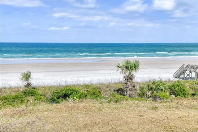 a bed room with a bed and a night stand