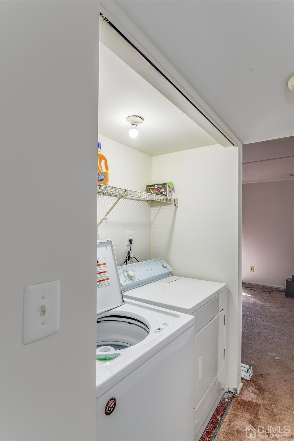 6902 Hana Road Edison, NJ 08817 - Photo 16 of 24 a utility room with dryer and washer