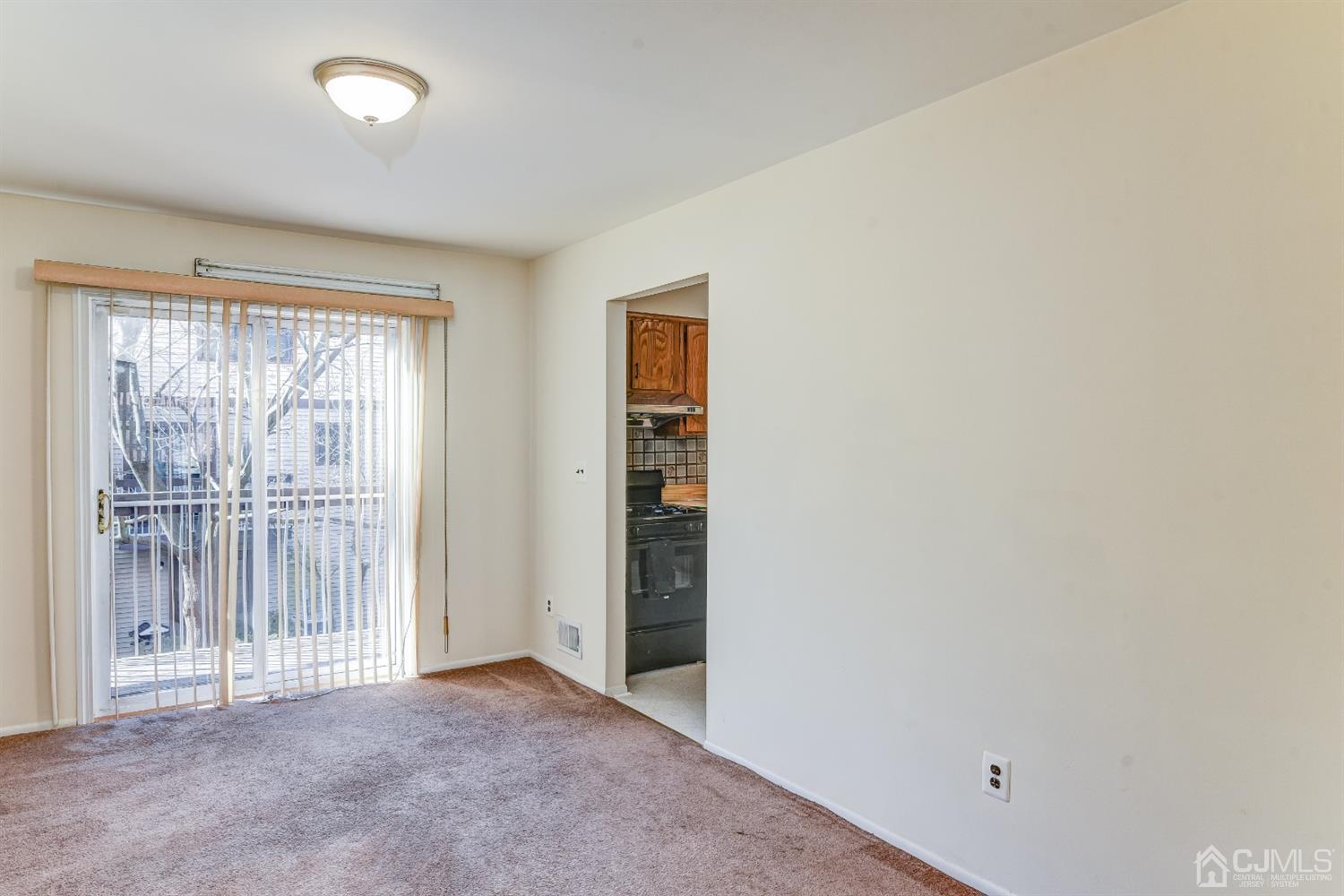 6902 Hana Road Edison, NJ 08817 - Photo 6 of 24 an empty room with windows