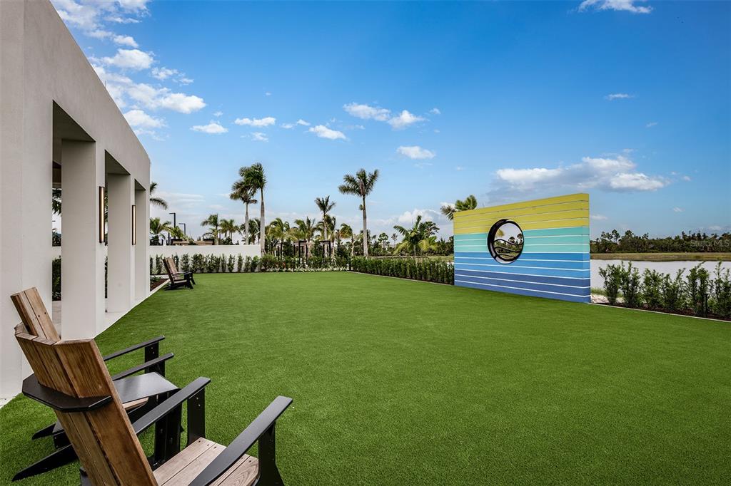 18443 Green Garden Venice, FL 34293 - Photo 24 of 40 a view of a chair and table in the garden