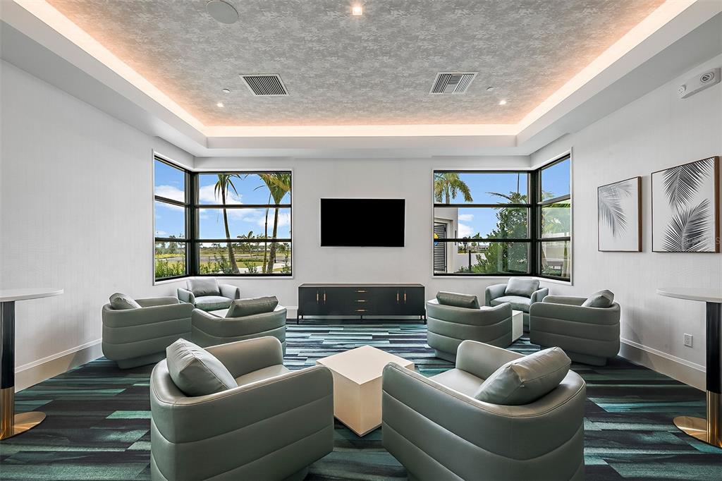 18443 Green Garden Venice, FL 34293 - Photo 25 of 40 a living room with furniture and a flat screen tv