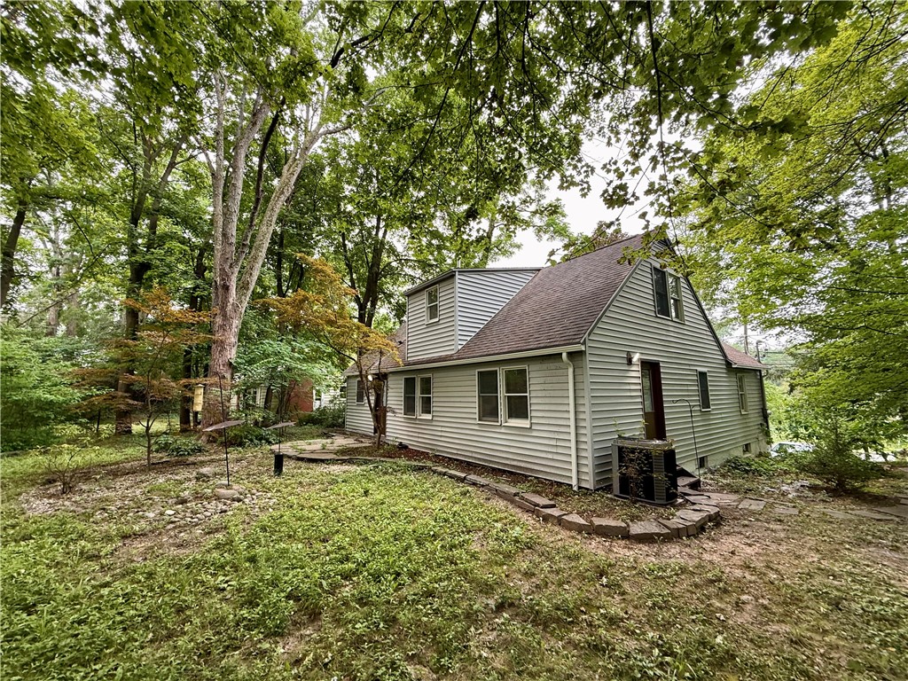 325 Highland Road Ithaca Town, NY 14850 - Photo 2 of 27 Park-like backyard