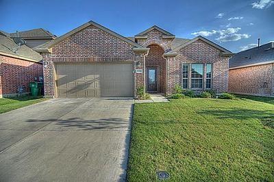 1111 Bexar Avenue Melissa, TX 75454 - Photo 1 of 1 a front view of a house with garden