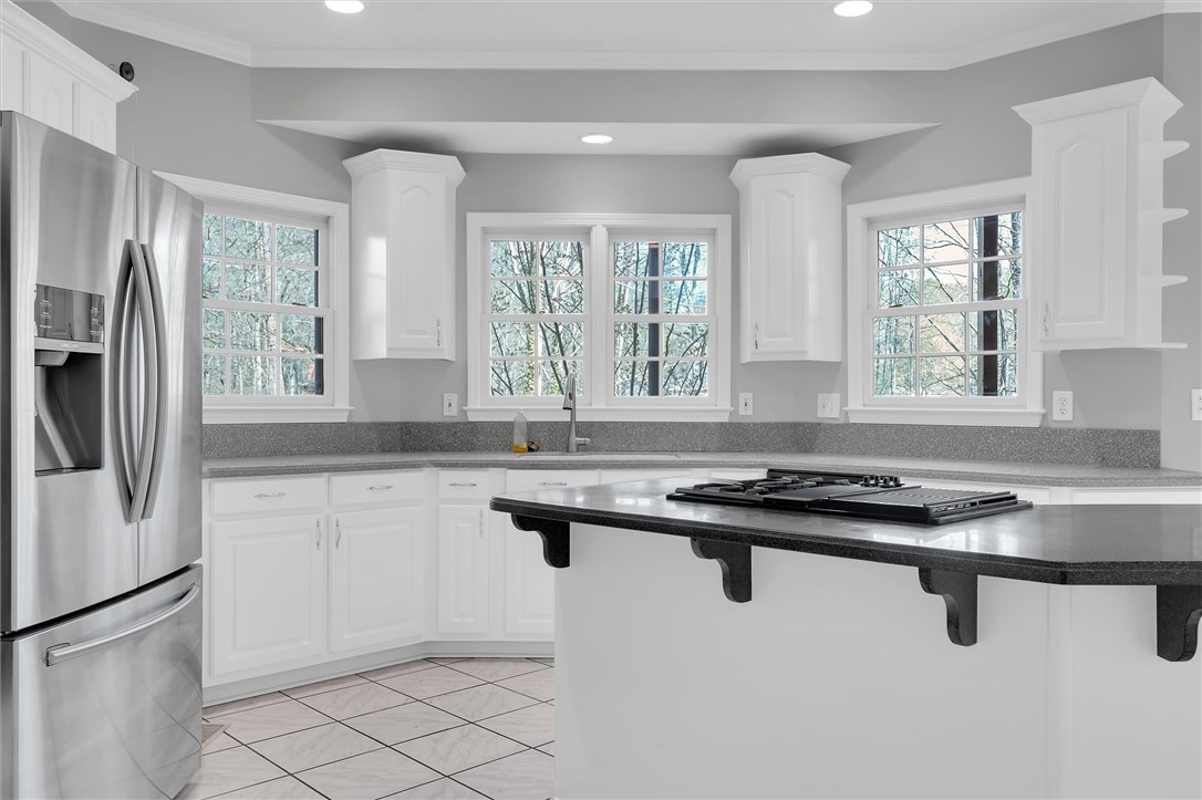 204 Red Maple Way Clemson, SC 29631 - Photo 12 of 48 Bright and inviting kitchen with modern appliances and ample counter space.