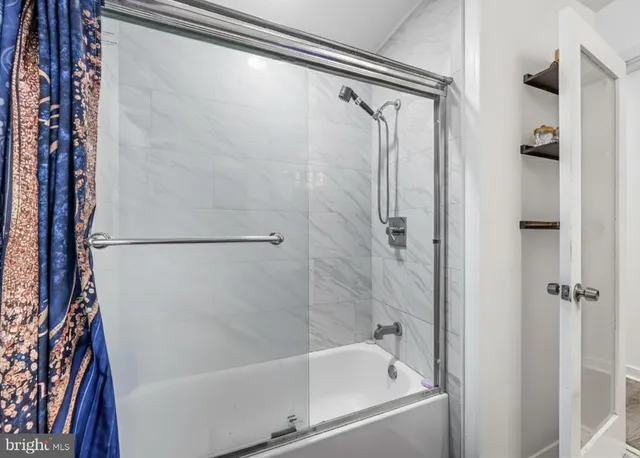 a bathroom with a bathtub