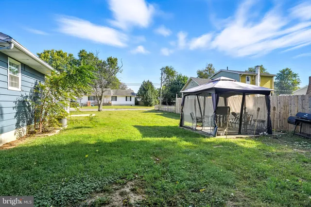 an aerial view of a house with swimming pool