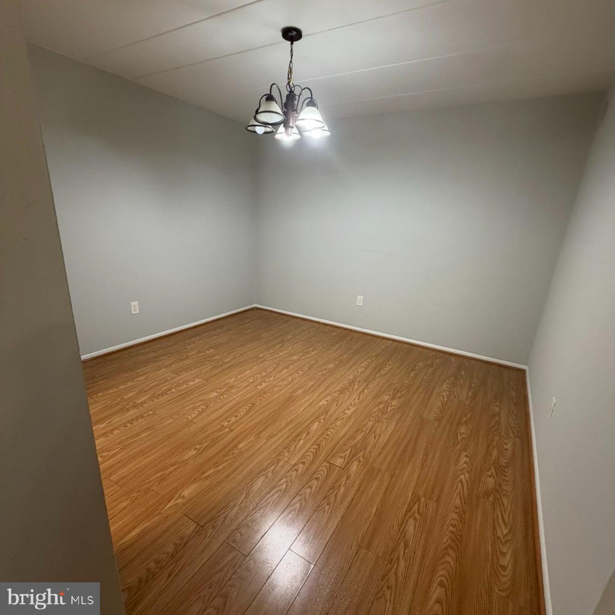 2628-00 Welsh Road, Unit 111 Philadelphia, PA 19152 - Photo 11 of 11 a view of empty room with wooden floor