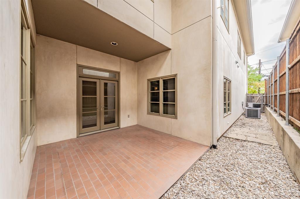 3635 Crestline Road Fort Worth, TX 76107 - Photo 38 of 40 a view of a house with a backyard
